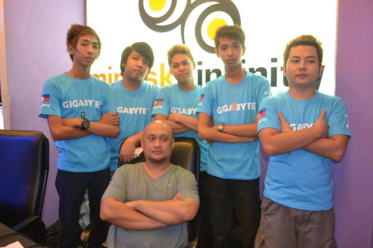 Julz and the boys posing at the Mineski Infinity Cafe in Manila, Philippines.